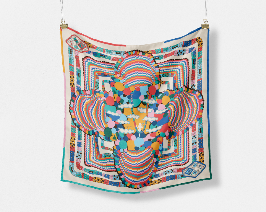 The Alice silk scarf, worn at the neck
